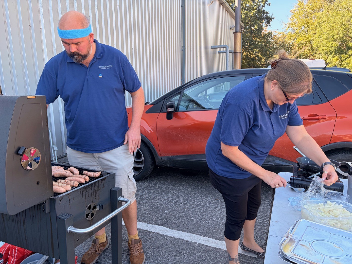 Dave and Emma at their work station BBQ